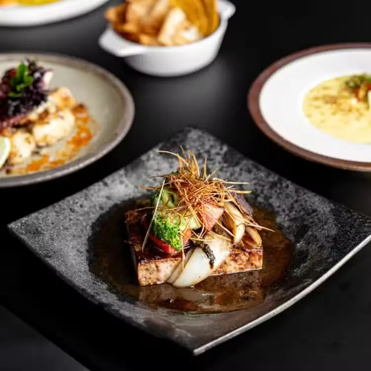 Miso-glazed black cod with charred vegetables