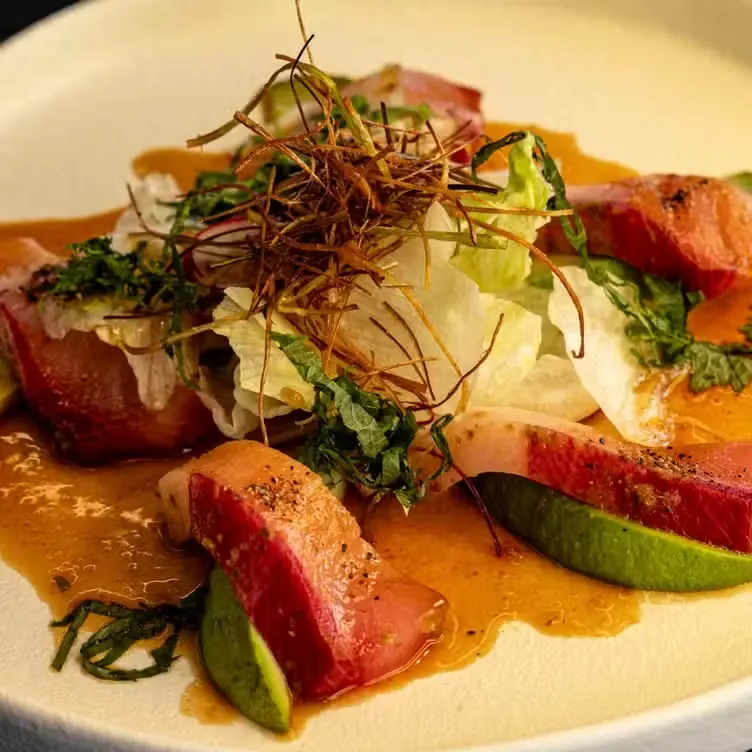 Sashimi with avocado and citrus sauce