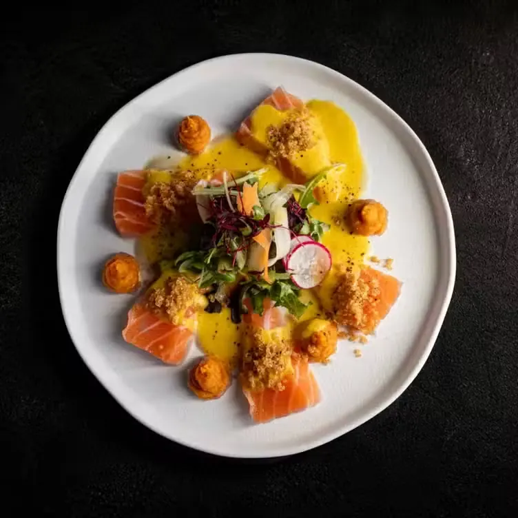 Salmon carpaccio with citrus sauce
